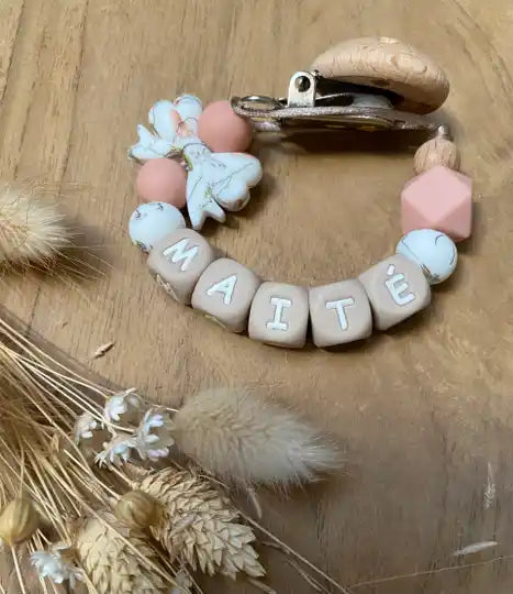 Speenkoord met naam strik/roze