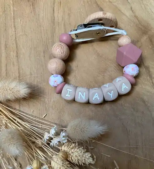 Speenkoord met naam regenboog/bloem