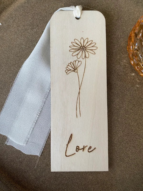 Boekenlegger met geboortebloem